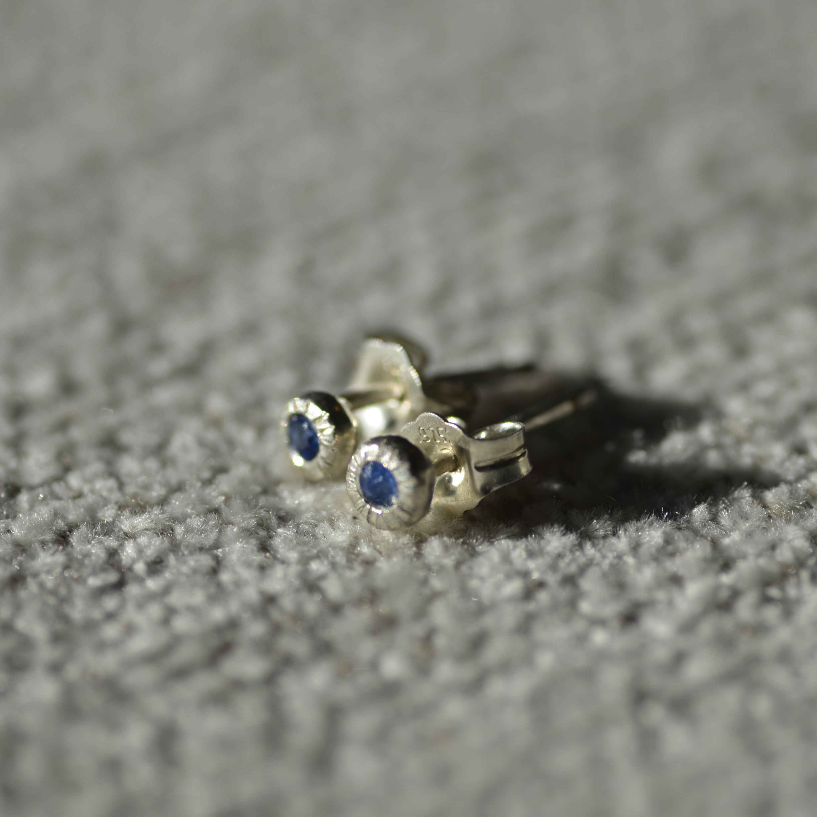Silver earrings with blue sapphire 